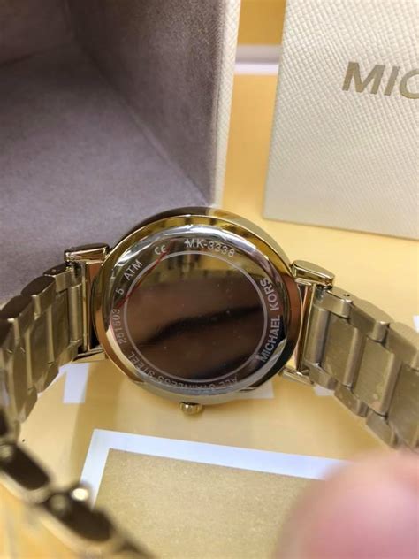 check michael kors watch serial number|michael kors watch authenticity check.